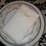 Crsip Linen Hemstitched napkins with personalized seating cards adds to the refinement of this winter wedding